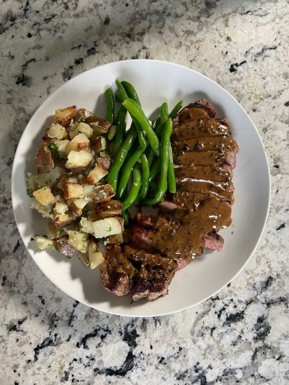 Steak With Creamy Peppercorn Sauce